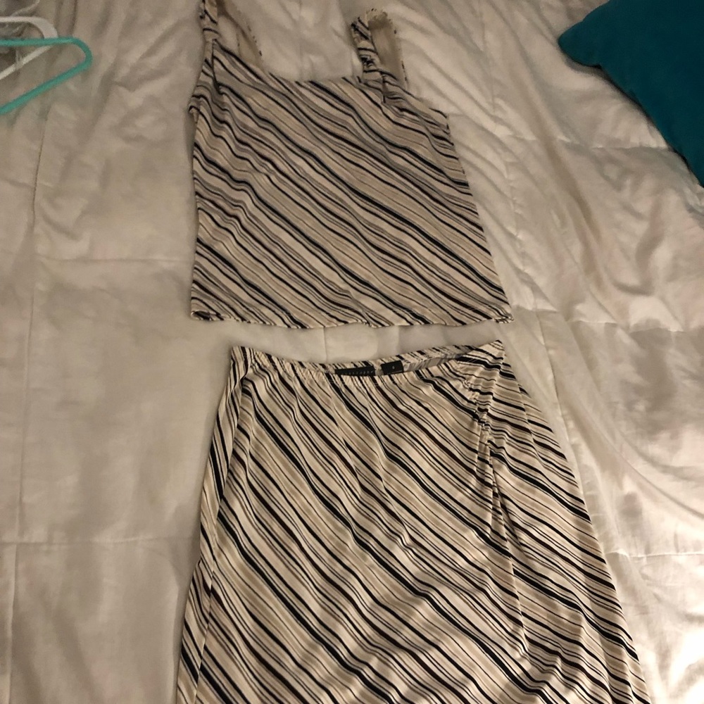 Women’s two piece tank and skirt. Top-Size M Btm-S